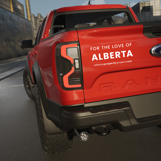 Red Ford Ranger truck with 'For the Love of Alberta' text on a city street.